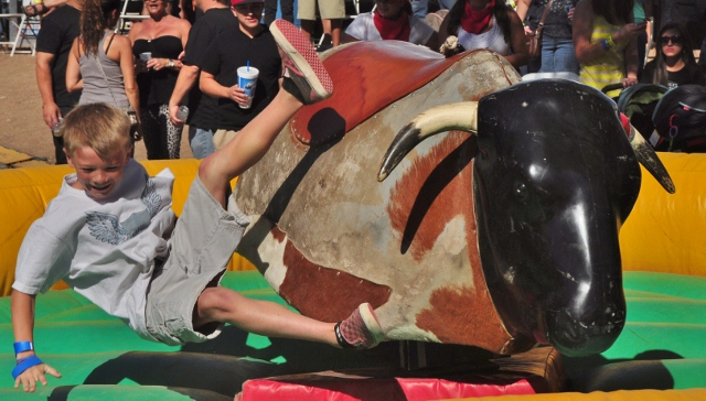 a young mechanical bull rider